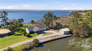 $20K Price Drop!! Tucked away on a quiet peninsula along the - photo 3