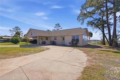 $20K Price Drop!! Tucked away on a quiet peninsula along the - photo 5