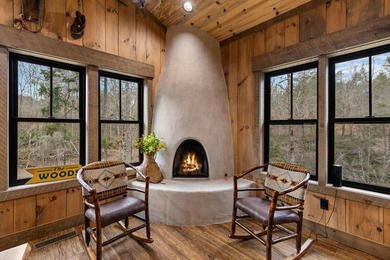 Set on 8.5 pristine acres, this extraordinary custom-built cabin - photo 36