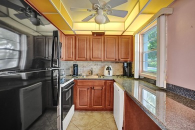 Private, first floor corner unit, furnished 2 bedroom/1.5 bath - photo 7