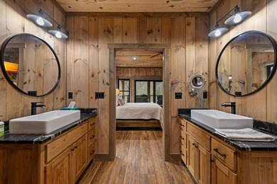 Set on 8.5 pristine acres, this extraordinary custom-built cabin - photo 50