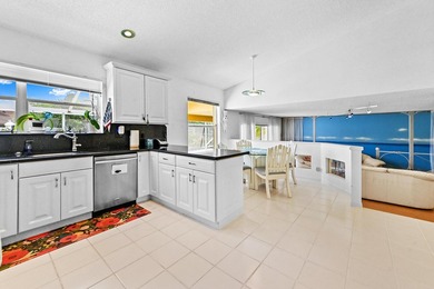 Welcome to a vibrant Lake Charleston pool home that blends - photo 11