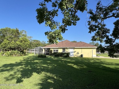 Serenity abounds in this well-maintained concrete block home - photo 3