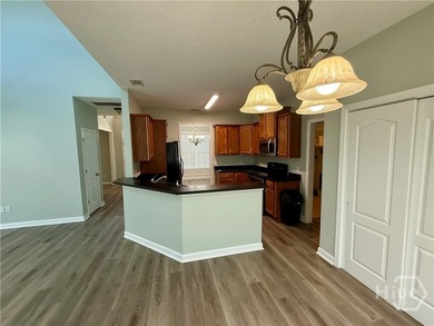 Welcome to this spacious and well-appointed 4 bedroom, 3 - photo 6