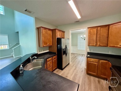 Welcome to this spacious and well-appointed 4 bedroom, 3 - photo 9