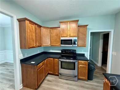 Welcome to this spacious and well-appointed 4 bedroom, 3 - photo 10