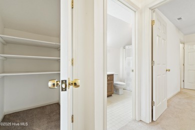 This spacious coastal home sits in the middle of a generous