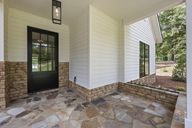 Introducing a stunning new construction home on the serene - photo 5