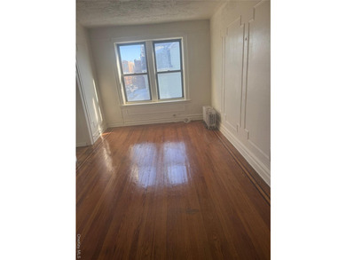 Welcome to this spacious 2-bedroom, 1-bath co-op located in the - photo 8