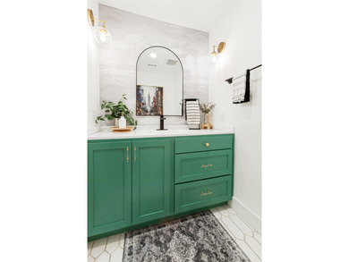 Welcome to 411 Ridgewood Dr, a fully reimagined 5-bedroom, 3 - photo 13