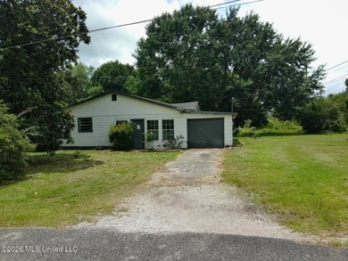 Potential awaits on this one-acre corner lot. The layout - photo 1