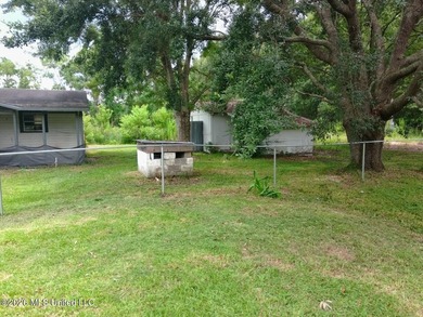 Potential awaits on this one-acre corner lot. The layout - photo 9