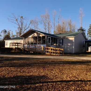 Lake Home Off Market in Marianna, Florida