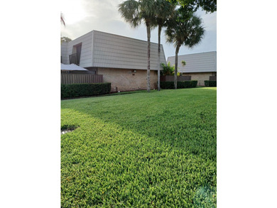 Centrally located large townhome with tile on 1st floor, wood on - photo 2