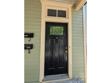 Victorian District - Originally built as a single family home - photo 3