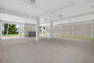 Enjoy living in the heart of Downtown Pass Christian. This - photo 5