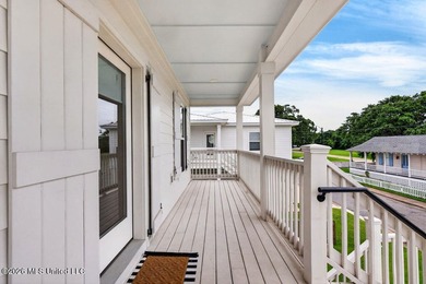 Enjoy living in the heart of Downtown Pass Christian. This - photo 6