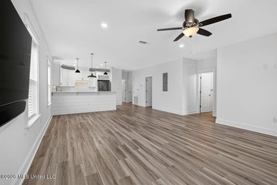 Enjoy living in the heart of Downtown Pass Christian. This - photo 9
