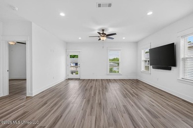 Enjoy living in the heart of Downtown Pass Christian. This - photo 10
