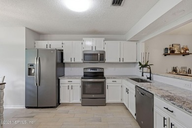 Welcome home to this beautifully updated home featuring - photo 10