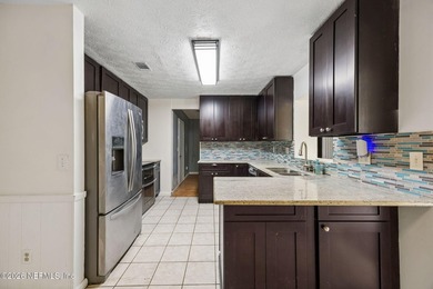 Enjoy Florida living at its best in this beautifully maintained - photo 9