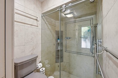 This well-maintained 3-bed, 2-bath CBS pool home sits on one of - photo 13