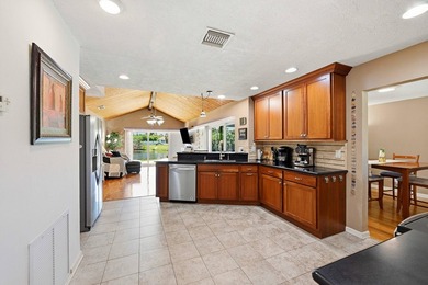 This well-maintained 3-bed, 2-bath CBS pool home sits on one of - photo 18