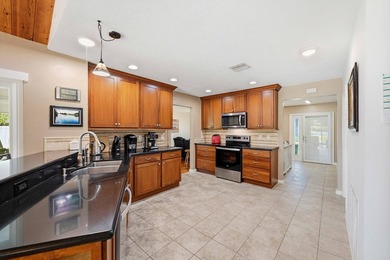 This well-maintained 3-bed, 2-bath CBS pool home sits on one of - photo 24
