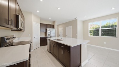 Welcome home to this beautifully maintained end-unit townhome - photo 8