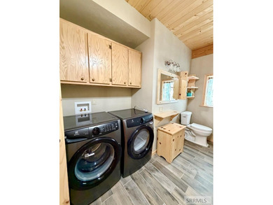 THIS HOME IS IN A HENRYS LAKE COMMUNITY WITH MARINA FOR USE BY - photo 14
