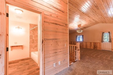 THIS HOME IS IN A HENRYS LAKE COMMUNITY WITH MARINA FOR USE BY - photo 18
