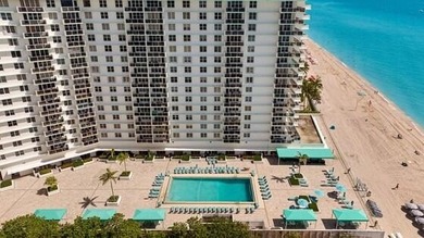 Live on the sand in this pristine oceanfront property featuring - photo 4