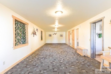 THIS HOME IS IN A HENRYS LAKE COMMUNITY WITH MARINA FOR USE BY - photo 24