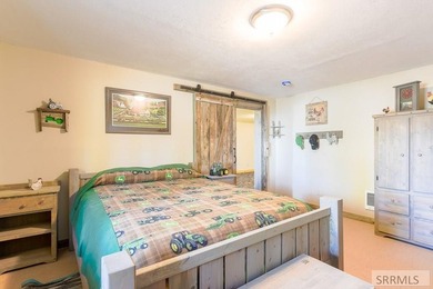 THIS HOME IS IN A HENRYS LAKE COMMUNITY WITH MARINA FOR USE BY - photo 28