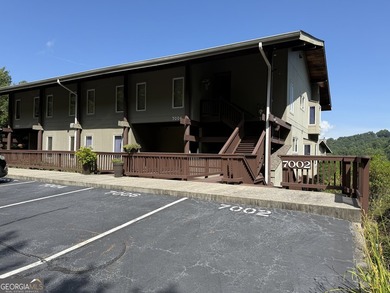 Escape to the mountains in this charming 2-bedroom, 2-bathroom - photo 1