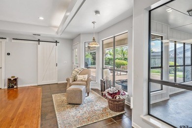 Tucked inside the prestigious gated community of Emerald Bay in - photo 15