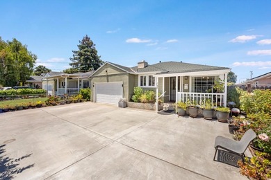 Welcome to 123 Gardenia Way in East Palo Alto, a spacious and - photo 4