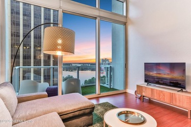 Wake up to breathtaking sunrise views over Lake Eola from this - photo 2