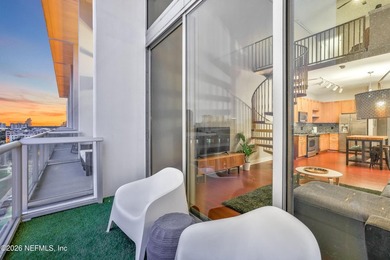 Wake up to breathtaking sunrise views over Lake Eola from this - photo 5