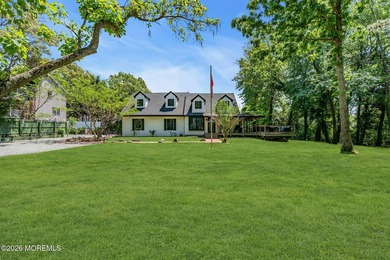 Tucked away on over an acre of private land, this beautifully - photo 11