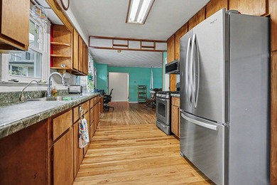 Enjoy the Gull Lake lifestyle with 70' of lake access and shared - photo 12