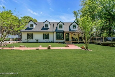 Tucked away on over an acre of private land, this beautifully - photo 12