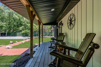 Tucked away on over an acre of private land, this beautifully - photo 13