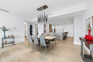 Experience luxury waterfront living at AquaBlu in Fort - photo 13