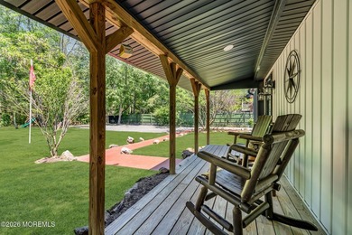 Tucked away on over an acre of private land, this beautifully - photo 14