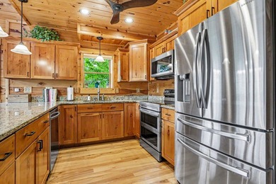 An exceptional opportunity to own a custom Jubach log cabin on - photo 16