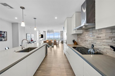 Experience luxury waterfront living at AquaBlu in Fort - photo 16