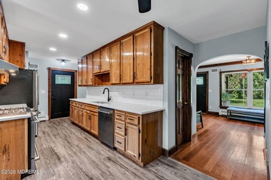 Tucked away on over an acre of private land, this beautifully - photo 33