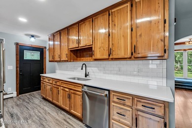 Tucked away on over an acre of private land, this beautifully - photo 34