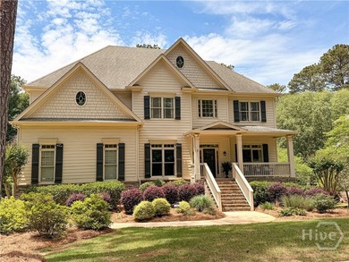 Set on a generous .68-acre lot with access to 15 acres of green - photo 1